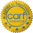 A yellow seal with blue stars and the words " aspire to excellence carf accredited ".